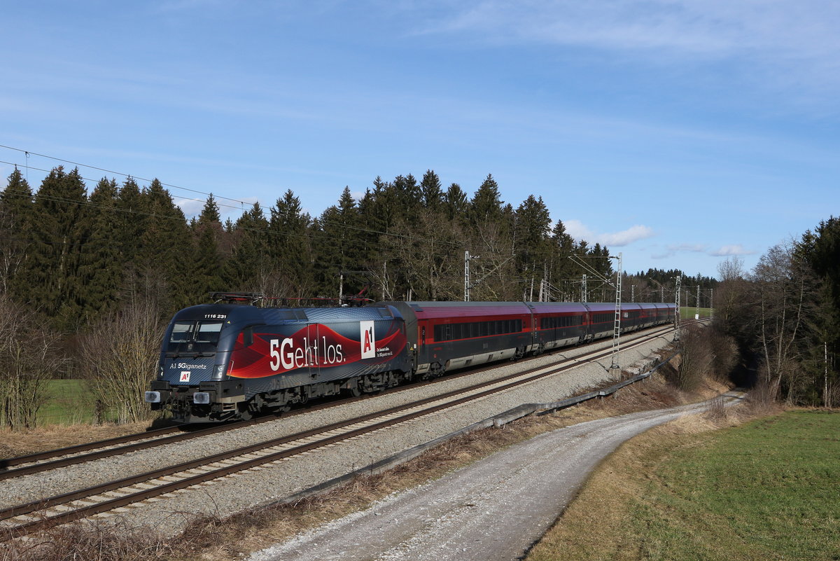 1116 231  5 geht los  mit einem Railjet aus Salzburg kommend am 4. Februar 2021 bei Grabenst�tt im Chiemgau.