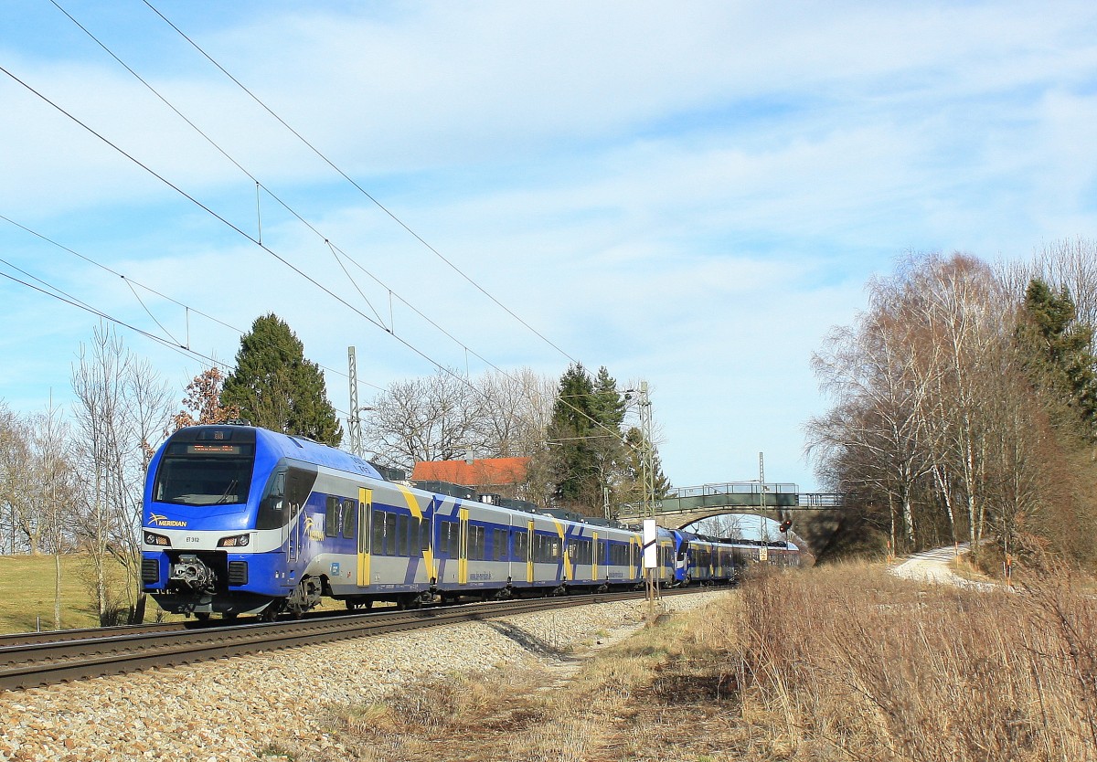 ET 312 ist am 15. Februar 2014 bei �bersee auf dem Weg nach M�nchen.