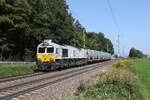 247 039 war am 4. September 2024 mit einem M�llzug bei Hufschlag in Richtung Traunstein unterwegs.