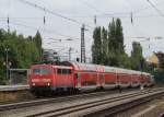 111 204-4 durchf�hrt soeben mit einem Regionalzug den Haltepunkt  Heimeranplatz .