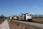 151 074 mit einem Containerzug aus M�nchen kommend am 3. M�rz 2022 bei �bersee am Chiemsee.